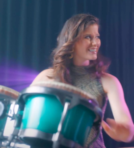 A Woman Playing Drums